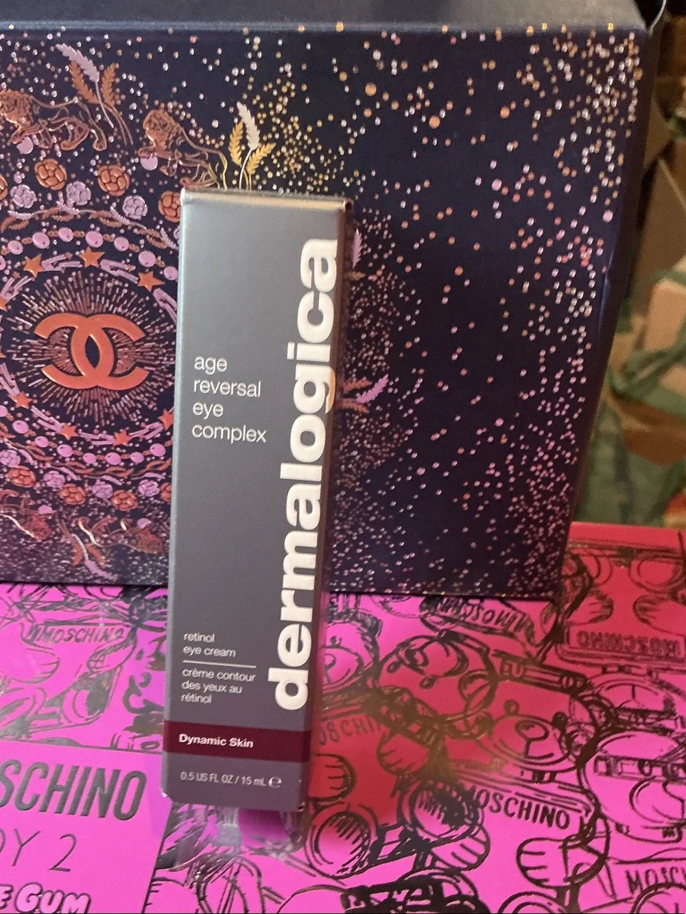 dermalogica Age Reversal Eye Complex in gray and burgundy packaging